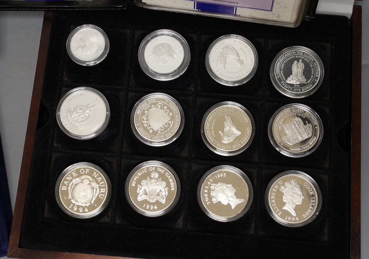 A cased collection of 15 Queen Elizabeth the Queen Mother 1994 proof silver coins, three QEII proof silver coins, Westminster Mint British Heroes crowns and 12 Queen Elizabeth II Coronation Jubilee coins